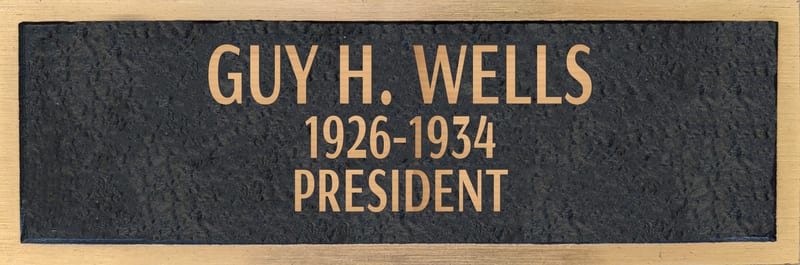 Bronze plaque for Guy H. Wells, retired 1934